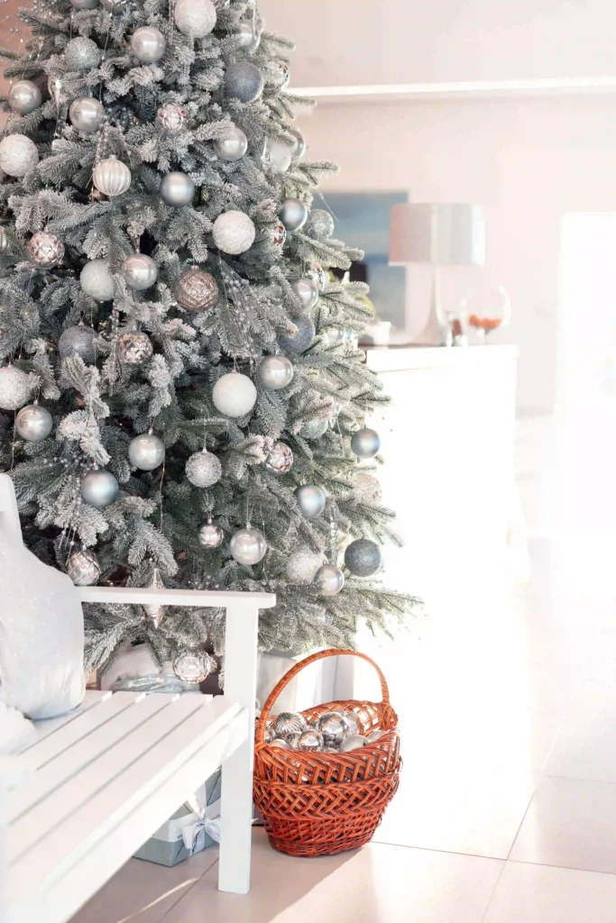 Flocked Christmas Tree Decorating Ideas with step-by-step setup showing lights, ornaments, and ribbons for beginners