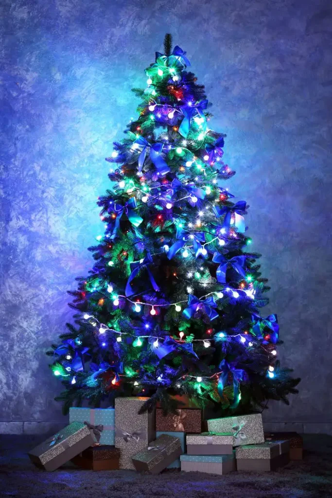 Blue And Silver Christmas Tree With Ribbon And Garland