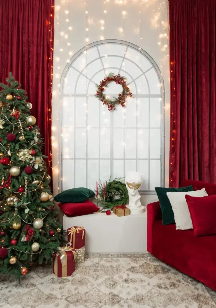 Red and white Christmas tree ideas with coordinated mantel garlands, wreaths, and table decor