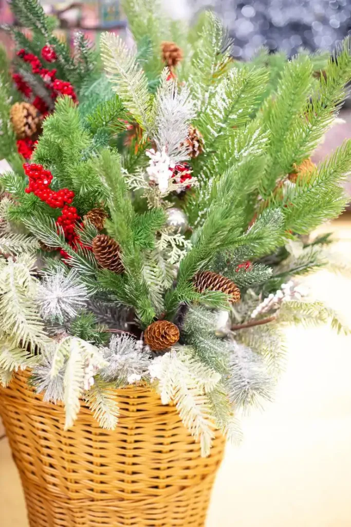 Red and white Christmas tree ideas on a fresh real tree with pinecones and berries