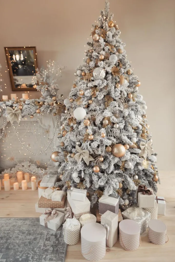 vintage Christmas tree with warm lighting, tree skirt, and rustic accessories